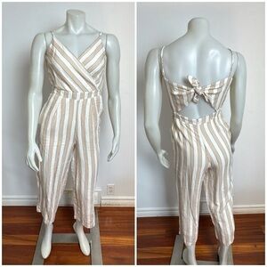 DEX - Striped Jumpsuit with Open and Tie-Back. 
Size XS